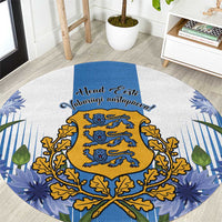 Blue round area rug with golden crest, blue text, and leaf-and-floral border