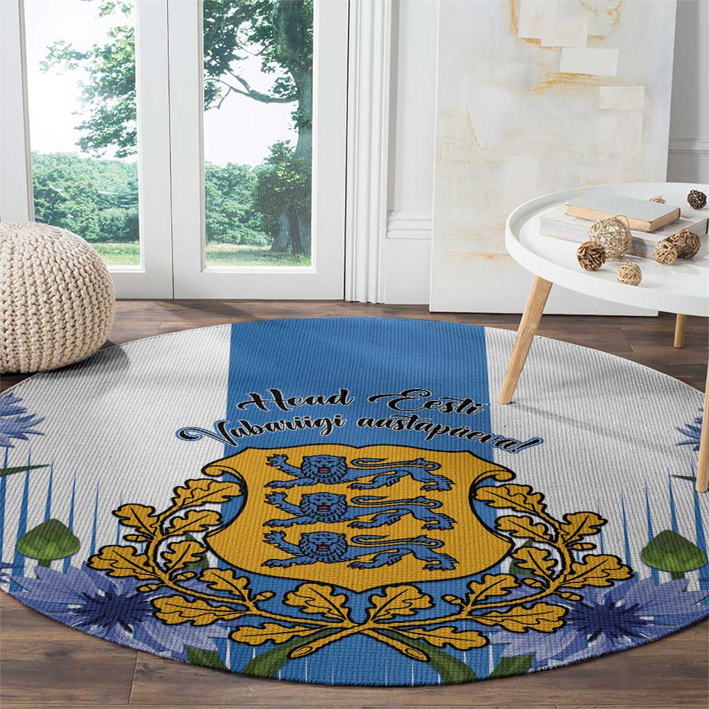 Blue round rug with golden crest, blue script text, and pine-leaf patterned border