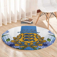 Blue round area rug with central golden crest, blue “Eesti” lettering, and leaf border