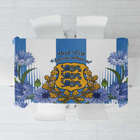 Blue tablecloth with Estonian crest and blue flower-and-leaf pattern