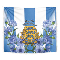 Close-up rectangular blue-and-white tapestry with Estonian crest, ribbon text, and blue blooms