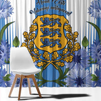 Window curtain panel close-up with blue florals, coat of arms, and decorative text