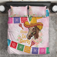 Pink bedding set with horse wearing sombrero, floral accents, and colorful patterned border