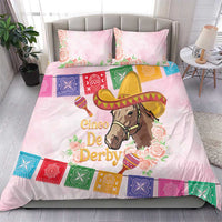 Pink duvet and pillow set featuring horse with sombrero, roses, and multicolor banner border