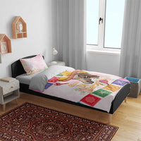 Pink duvet set featuring horse and sombrero, with rose motifs and colorful patchwork print