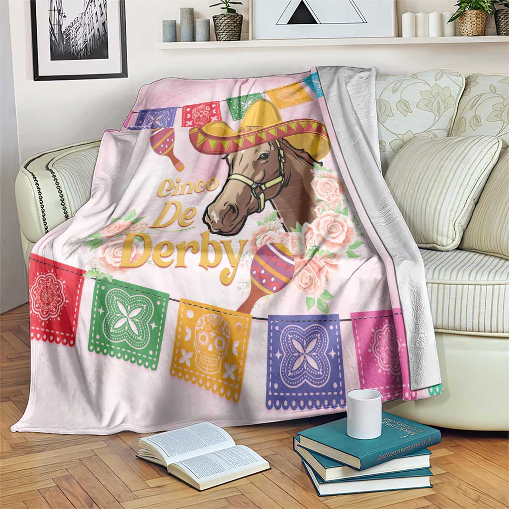 Pink horse racing blanket with sombrero horse portrait, floral roses, and multicolor banner squares.