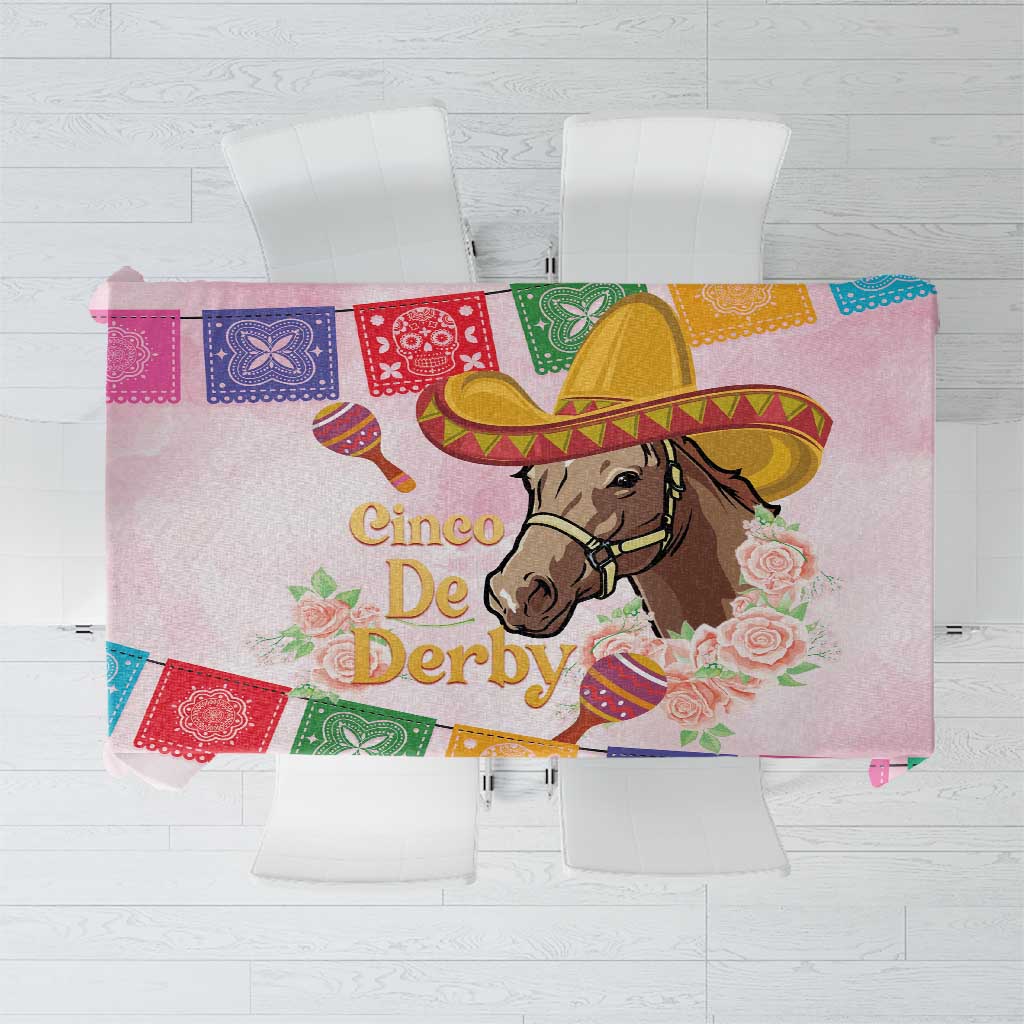 Pink tablecloth with Cinco De Derby horse and sombrero graphic plus colorful banner print