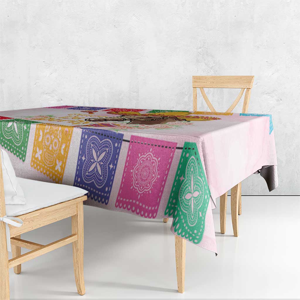 Pink tablecloth corner with colorful bandana stripe blocks and horse graphic detail