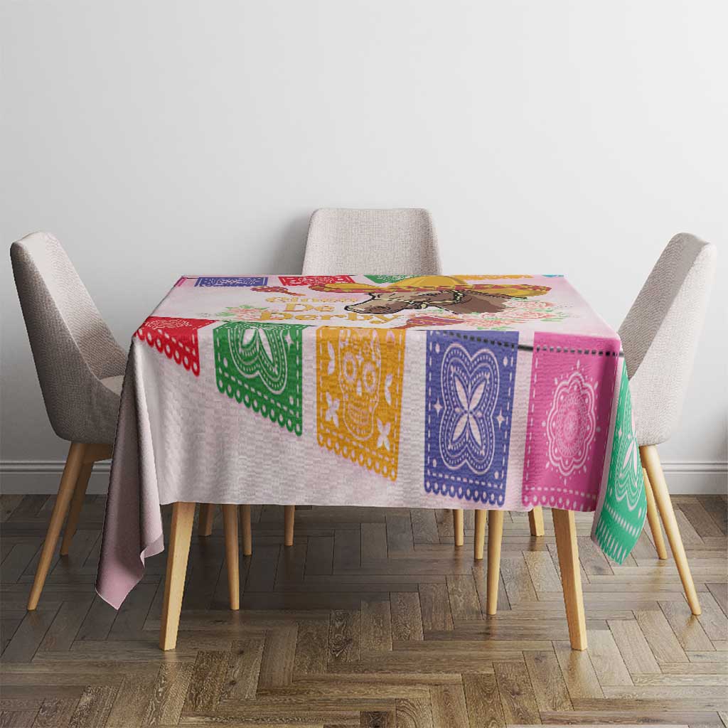 Pink tablecloth with colorful bandana border panels and horse graphic on dining table