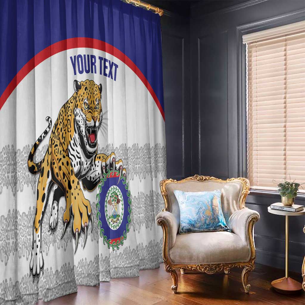 Blue and white window curtains with jaguar mascot artwork and crest graphic, hung on rod