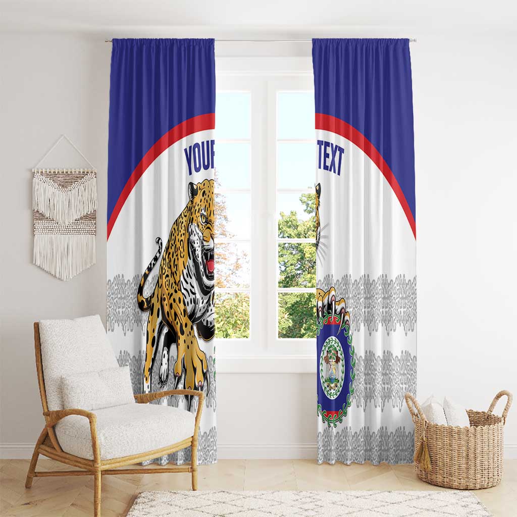 Blue and white window curtains with jaguar mascot and crest graphic centered on both panels