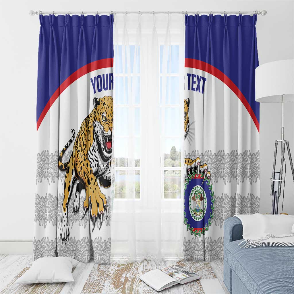 Blue and white window curtain pair with jaguar mascot and crest, shown with grommet rings