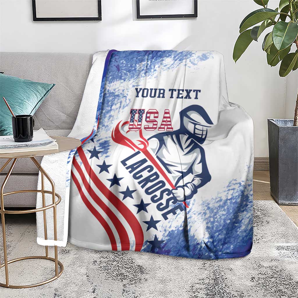 Custom USA lacrosse throw blanket with mascot graphic, blue splash pattern, and flag stripes.