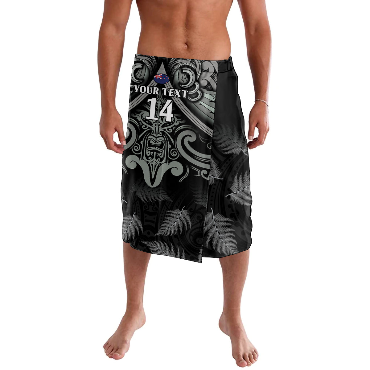 Black rugby lavalava shorts with silver fern and tribal pattern, elastic waistband