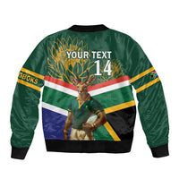 Green bomber jacket, back shows custom text 14 over springbok and flag stripes