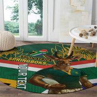 Round rug with close-up antelope mascot in green jersey, South Africa SPRINGBOKS text, and flag stripes.