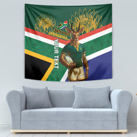 Green rugby tapestry showing mascot with South Africa Springboks text over flag stripes