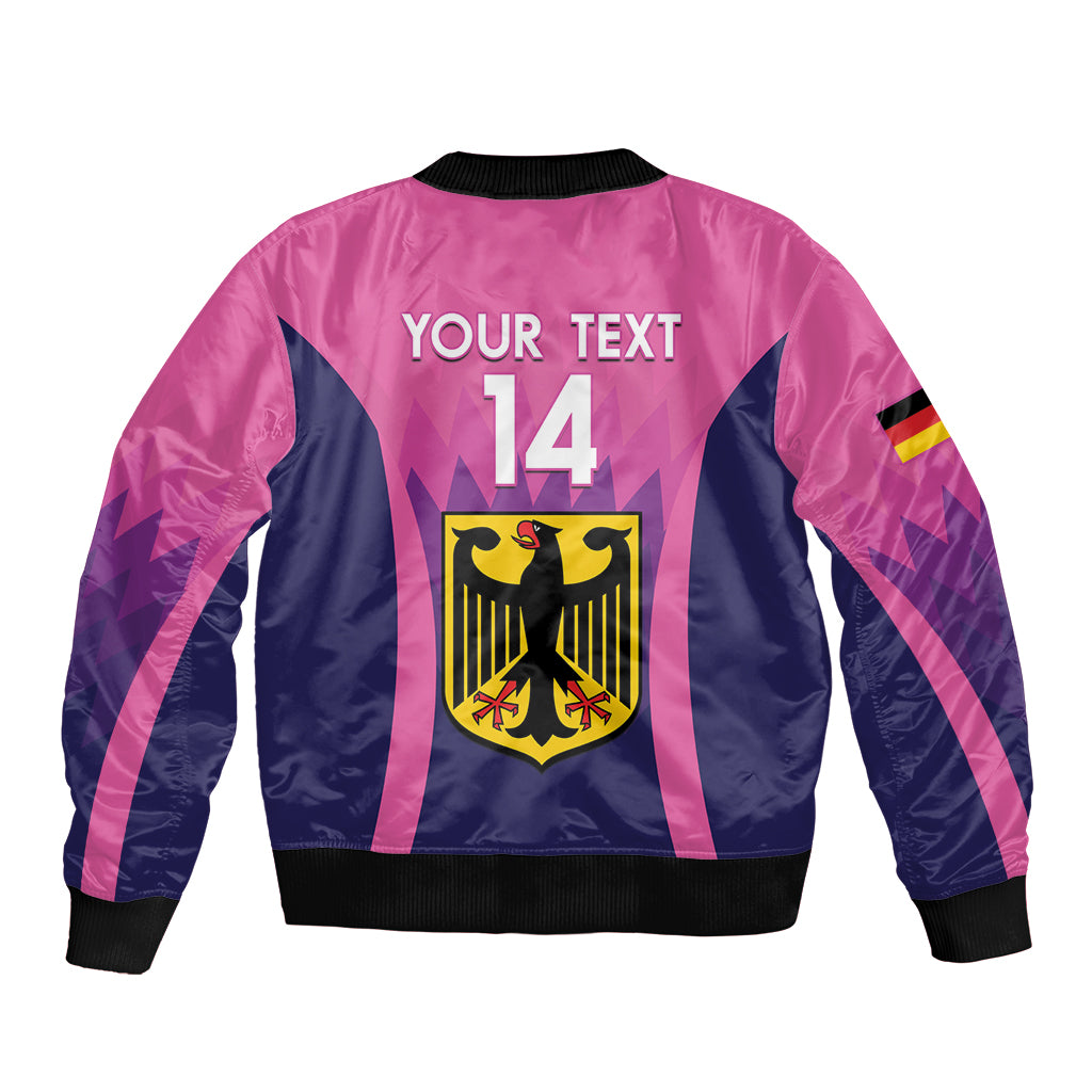 Pink and navy bomber jacket back with bold text, number 14, and shield crest graphic