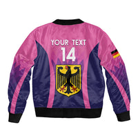 Pink and navy bomber jacket back with bold text, number 14, and shield crest graphic