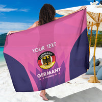 Pink and navy sarong with large Germany football crest and 'YOUR TEXT' across