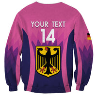 Unisex pink football sweatshirt with 'YOUR TEXT 14' and Germany crest back print