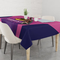 Pink and dark blue football tablecloth with Germany crest, draped over table