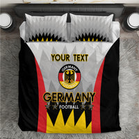 Germany football bedding set with black duvet, red stripe sides, yellow “Germany” text, crest.