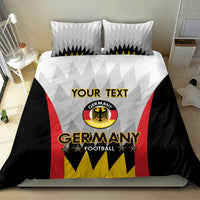 Germany football bedding set with black duvet, red stripes, yellow crest and “Germany” lettering.