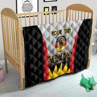 Germany football quilt in nursery, white center with red stripe, yellow base, black edges