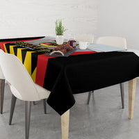 Black and red football tablecloth with yellow zigzag stripe and folded edge