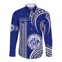 Blue long-sleeve button shirt with Polynesian kakau pattern and school crest graphic