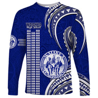 Blue long-sleeve shirt with Polynesian kakau pattern and school crest graphic on front