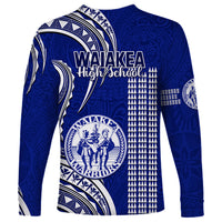 Blue long-sleeve shirt with Polynesian kakau pattern and school crest logo on back