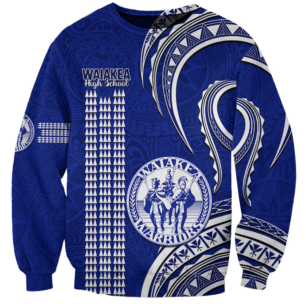 Unisex blue sweatshirt with Polynesian-style tribal pattern and school crest graphic