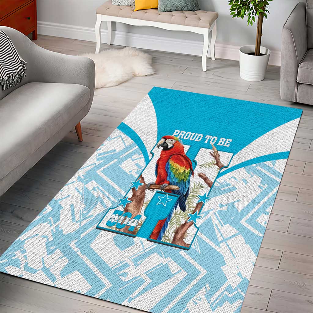 Blue area rug with white pattern, macaw artwork, and “Proud to Be” banner