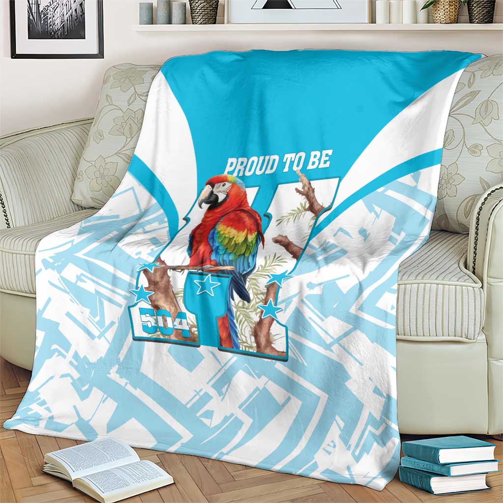 Blue-and-white blanket with scarlet macaw illustration, star icons, and “Proud to Be 504”