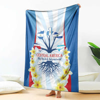 Independence Day blanket hanging vertically with tree roots and yellow flowers design