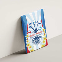 Blue wrapped canvas wall art on wall with Central America map, roots, and flower border