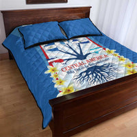 Blue quilt bed set with Central America map graphic, flowers, and two matching pillow shams