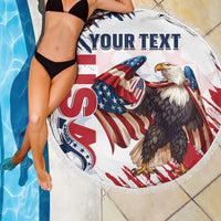 Round white beach blanket with fringe, bold eagle and patriotic rugby-style graphics