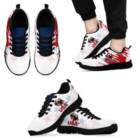 Pair of white lace-up sneakers with red/blue eagle and star print, black outsole.