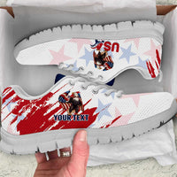White low-top sneakers with eagle and star print, red grunge stripe, white outsole.