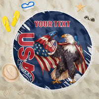 Round blue beach blanket with eagle and “YOUR TEXT” header, American rugby graphic, fringe.