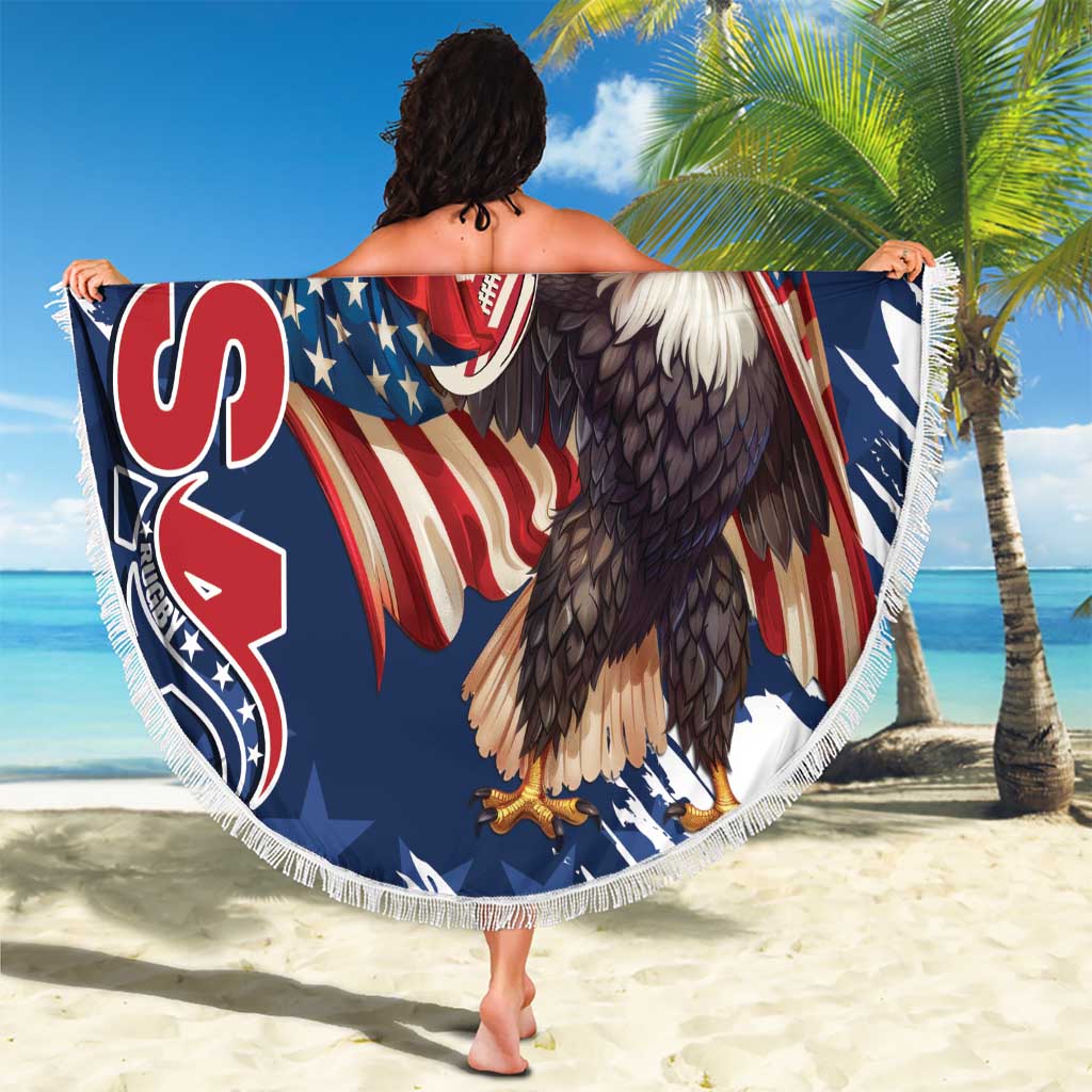 Round blue beach blanket with eagle and American rugby flag print, white fringe edge.