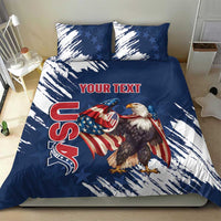 Blue bedding set with eagle, stars, and red “YOUR TEXT” on duvet and pillows
