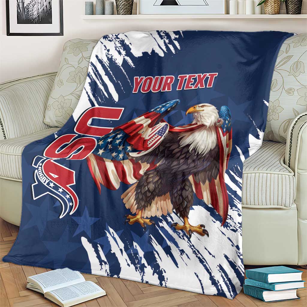 Blue eagle blanket on patterned armchair with grunge streaks and “YOUR TEXT” print.