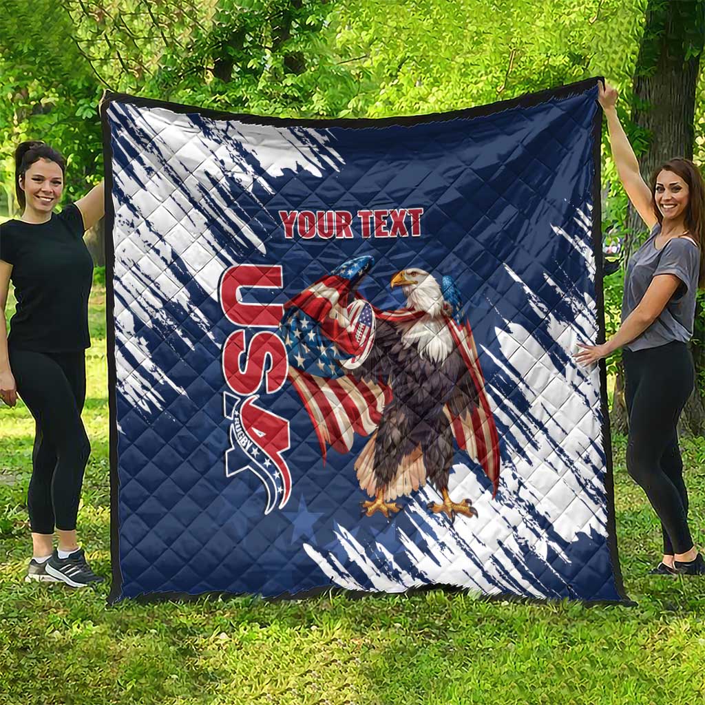Blue and white quilt spread in yard, quilted pattern with American eagle and “YOUR TEXT”