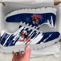Blue low-top sneakers with USA eagle graphic, white outsole, and 'YOUR TEXT' print