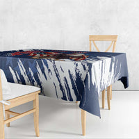Blue tablecloth with white paint-streak grunge brush design