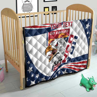 Custom quilt blanket on a baby bed with eagle design, “Your Text,” and patriotic stars